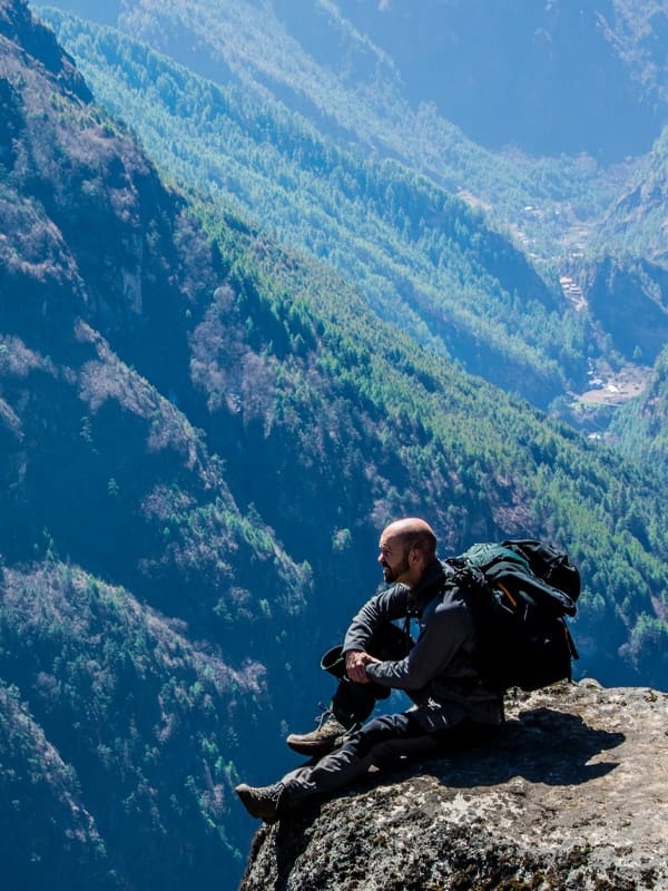 Carl Morris reflecting in the mountains of the Himalayas