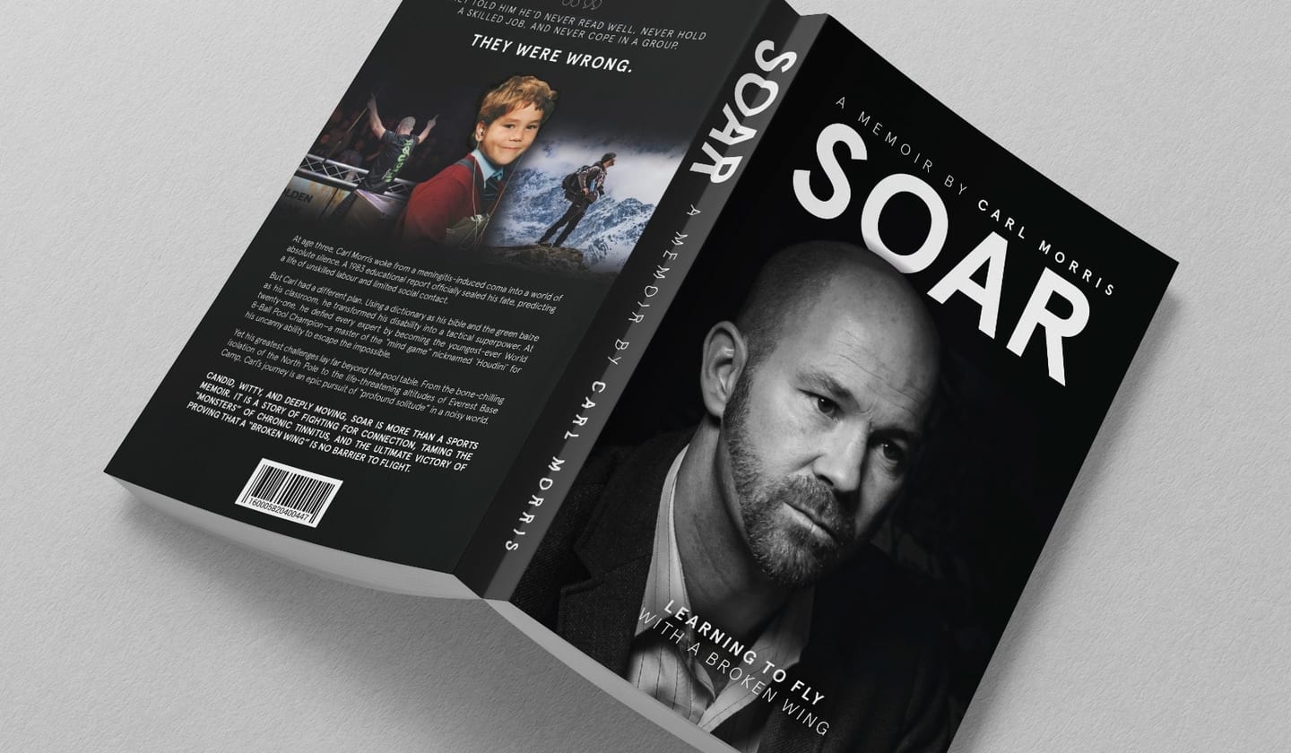 The SOAR paperback standing against a grey background