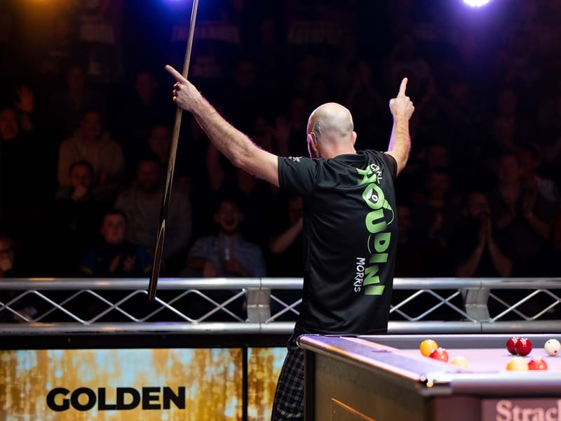 Carl Morris celebrating with the crowd during Ultimate Pool's Clash of the Titans